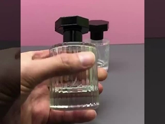 香水瓶30MLの六角形の円形の帽子の縦縞の香水スプレーのびん50ml